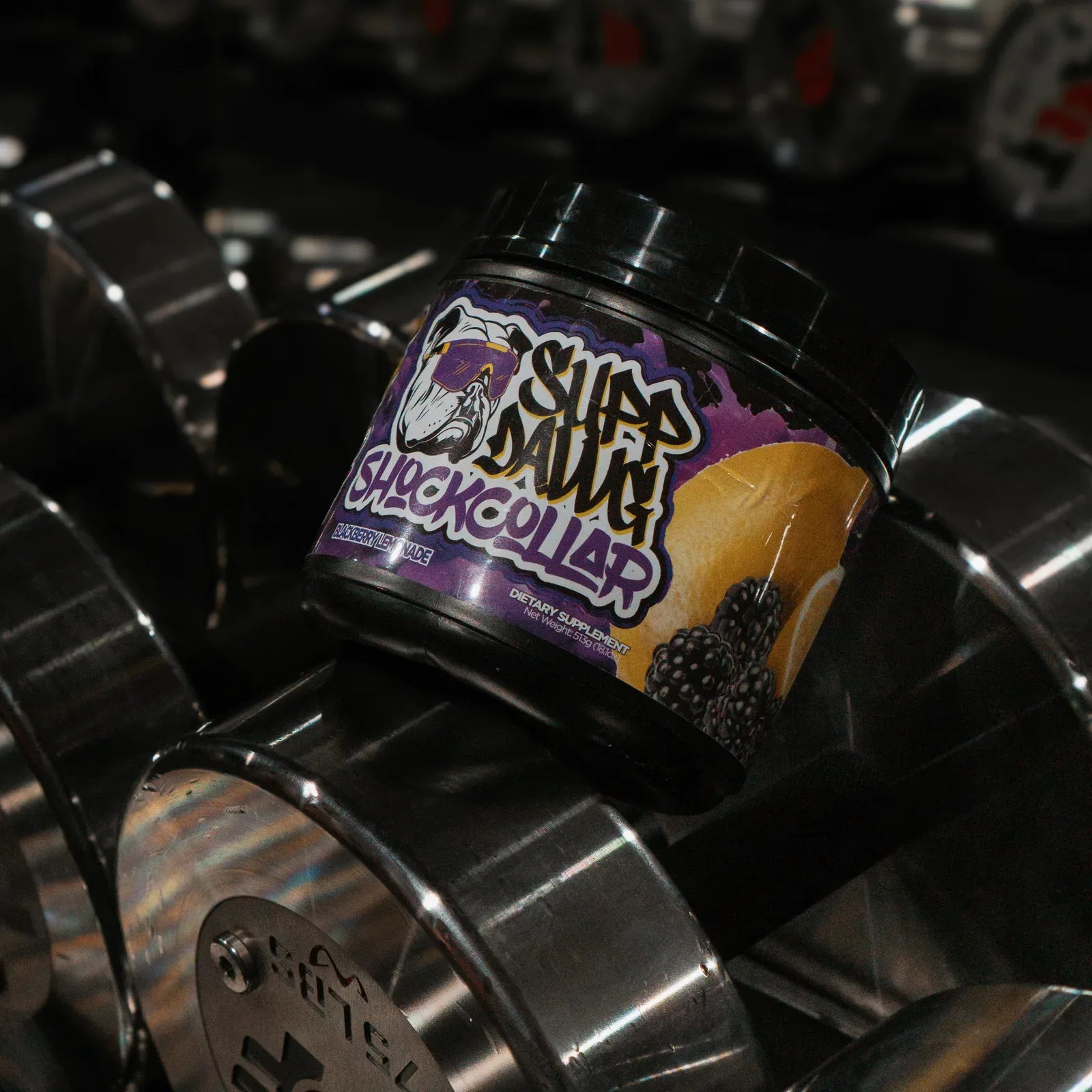 Shock Collar Blackberry Lemonade displayed on chrome dumbbells