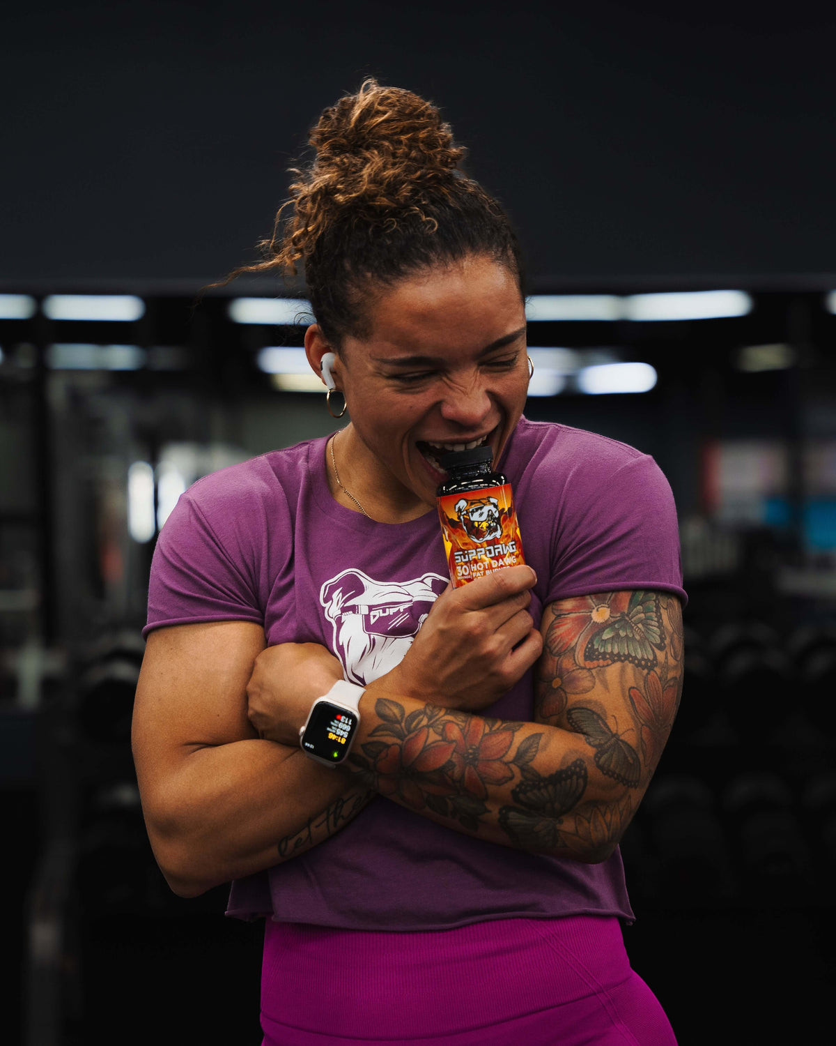 SuppDawg athlete holding HotDawg thermogenic and energy support