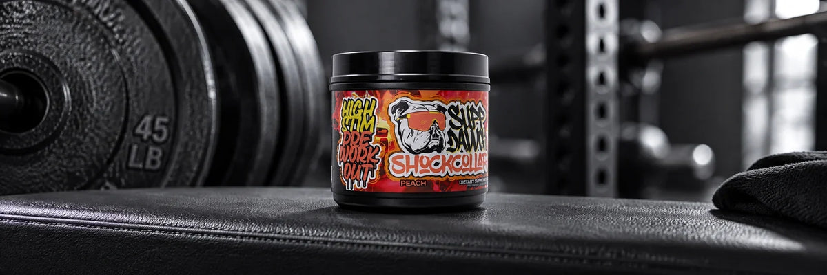 Shock Collar Peach tub on a gym bench beside weight plates.