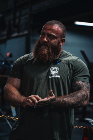 SuppDawg Logo T-shirt featuring a bulldog design, perfect for workouts, offering comfort and a great fit.