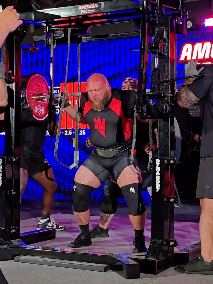 Strength athlete competing under the lights at the American Pro