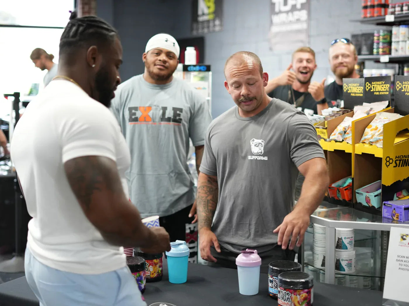 SuppDawg athletes and founder at a strength event