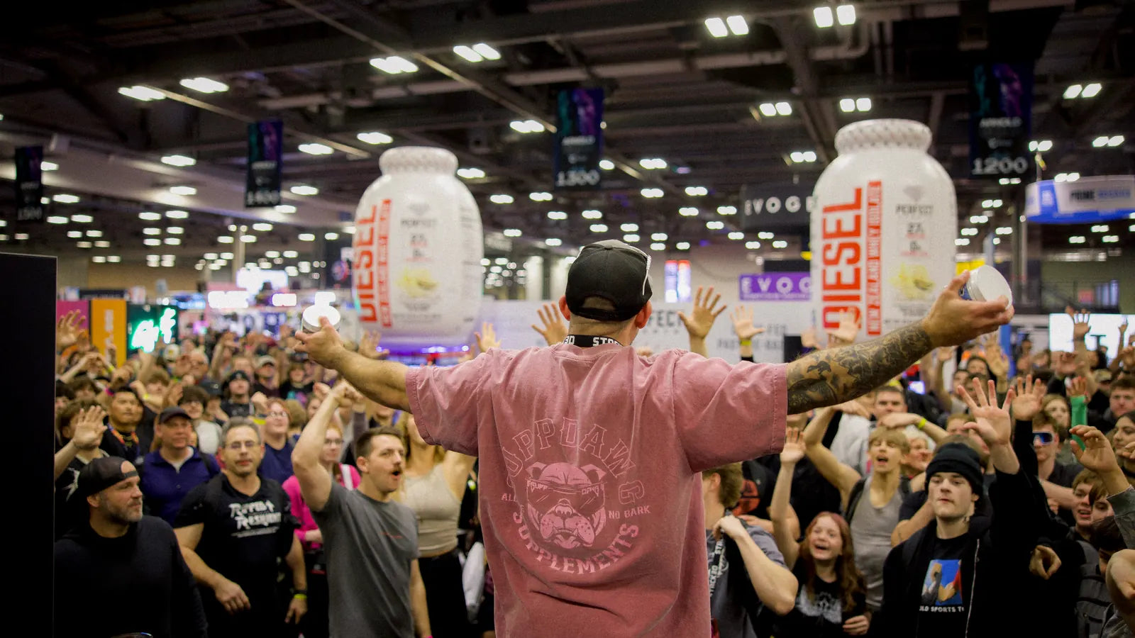 SuppDawg founder Chris Northern engaging with a large fitness expo crowd
